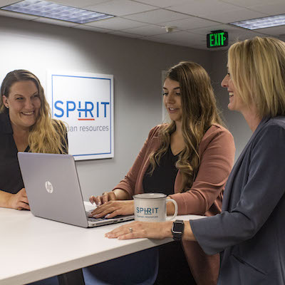 3 Spirit HR employees working together